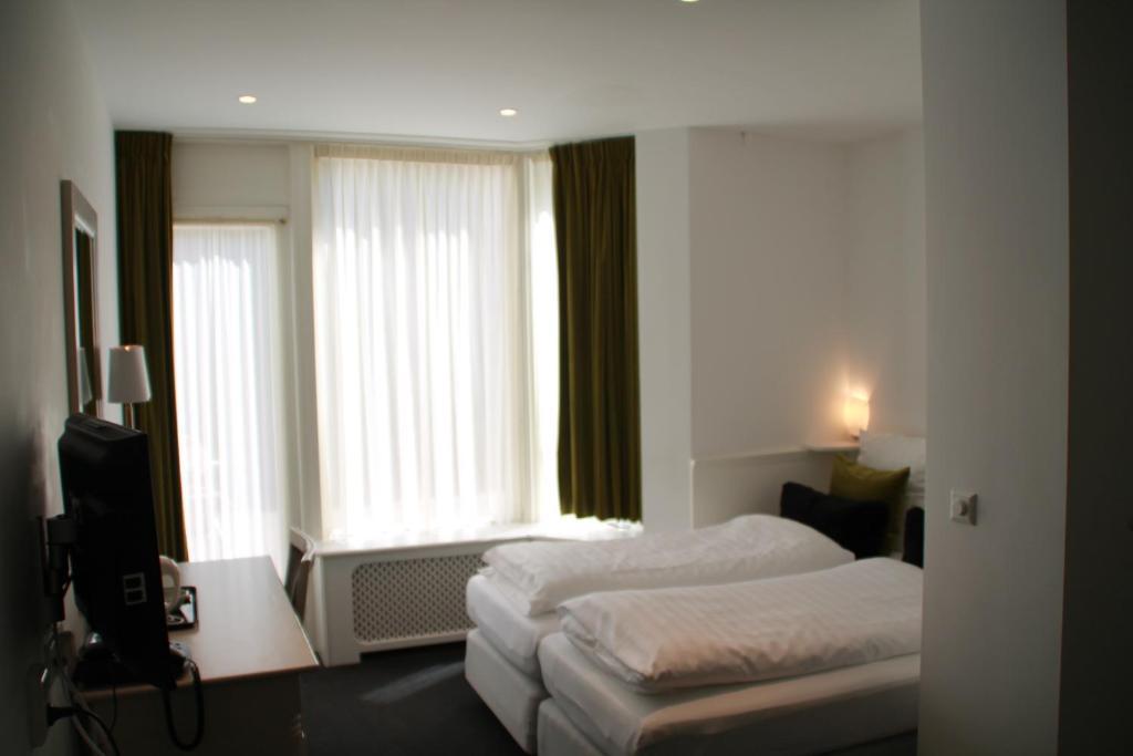 Hotel De Doelen Leiden Habitación foto